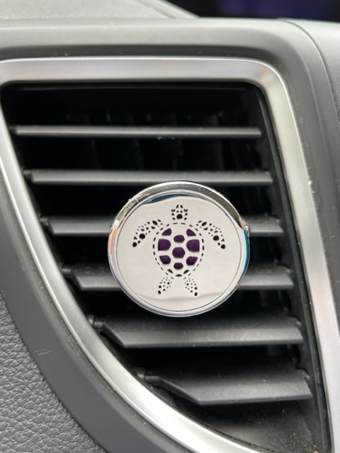 Car Diffuser with 1 tiny bottle of Calm and 1 tiny bottle of Energy and 10 pads